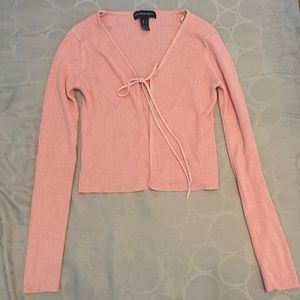 Hi, this is a small soft light pink blouse/shirt/coverup.